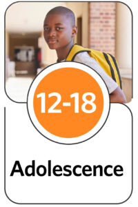 Black teen male with backpack at school. Image links to adolescence ages 12 through 18 ages and stages page.